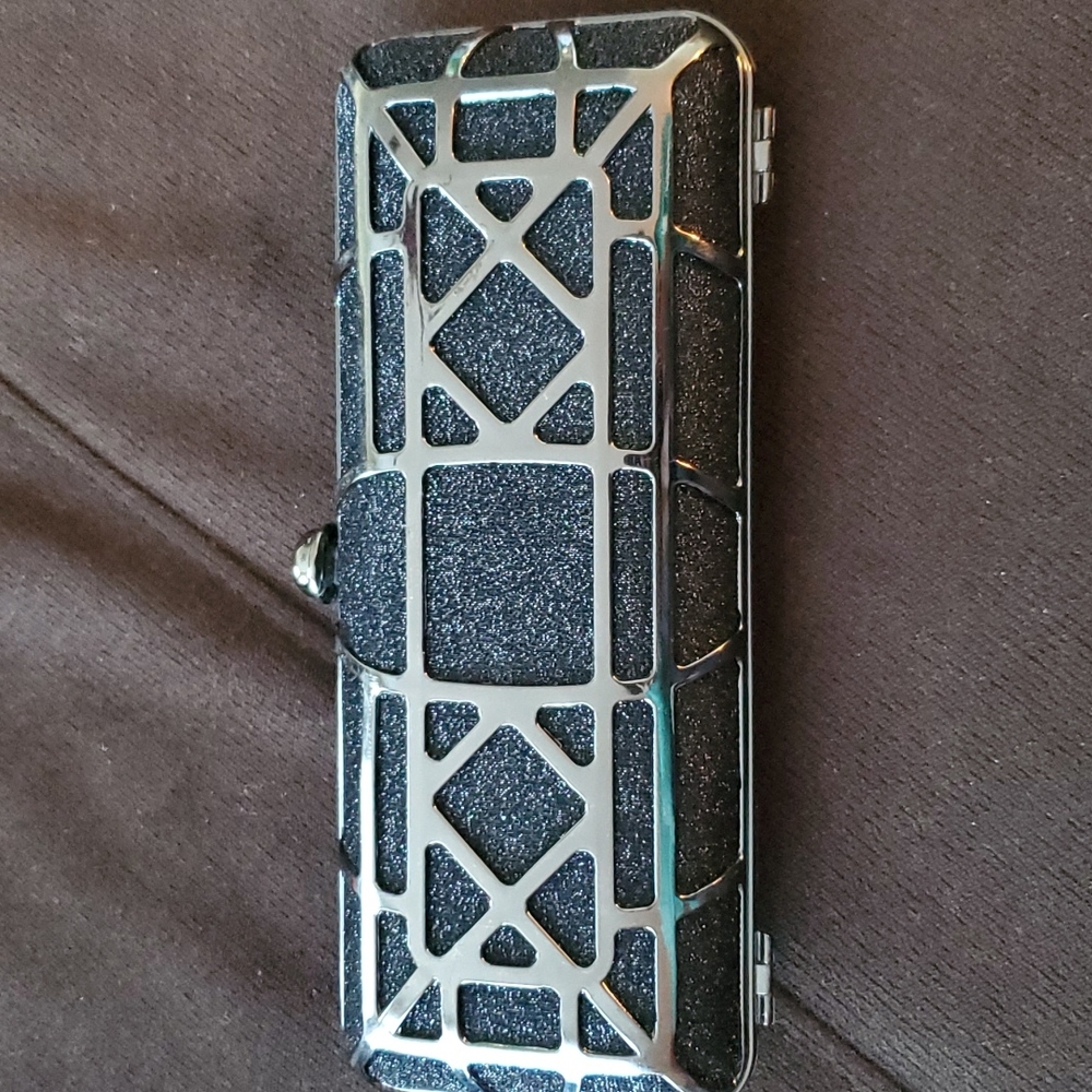 Bebe black metal geometric clutch
